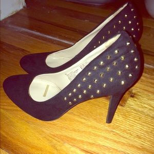 Gold studded black heels