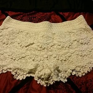 Off-white lace shorts