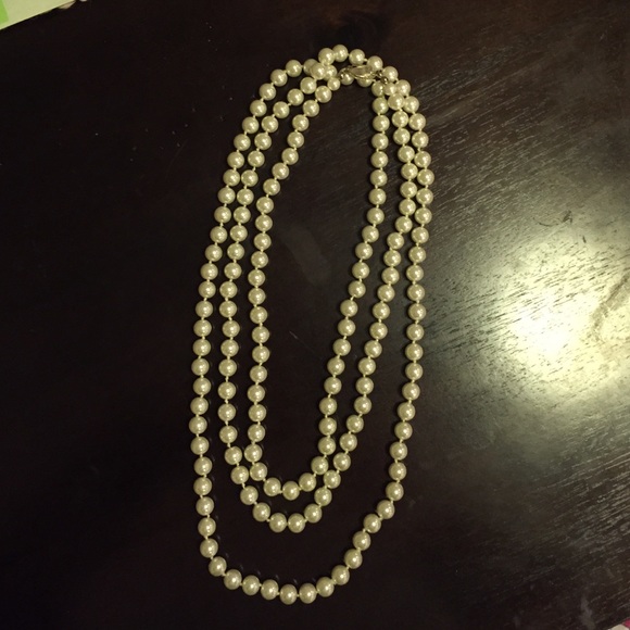 Long strand pearl necklace
