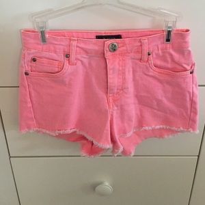 Bright pink acid washed shorts