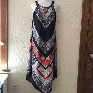 Long black patterned dress with key hole neckline