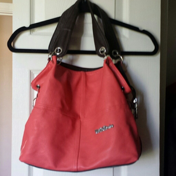 Deeper Coral purse super cute! LOTS of pockets!