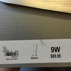 New black boots size 9w.