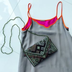 Beaded Aztec print and fringe envelope clutch.