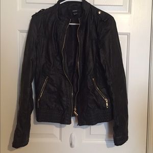 Black leather jacket with gold detail