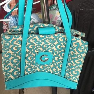 Guess turquoise handbag and wallet