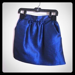 Sparkly blue skirt with black pattern print