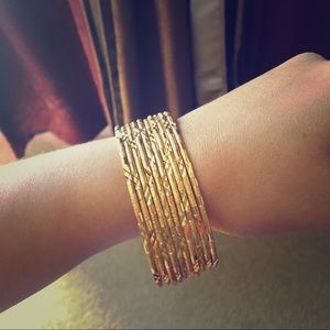 10 24ct gold plated bangles SOLD