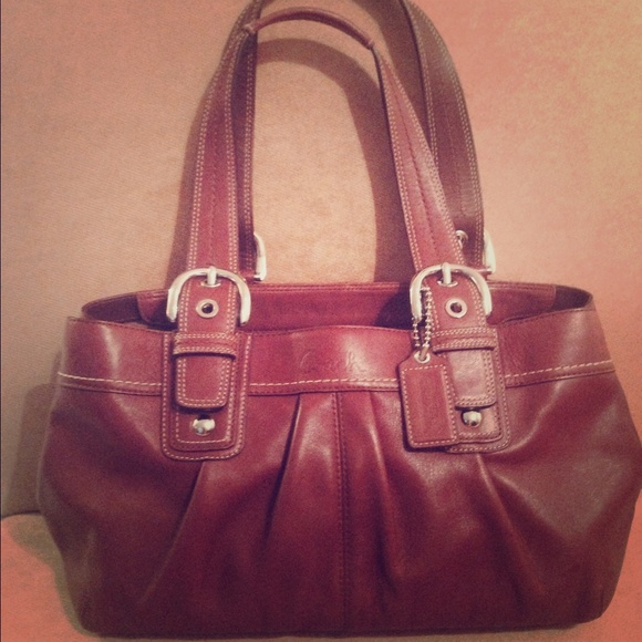 Authentic: Brown Leather Coach bag.