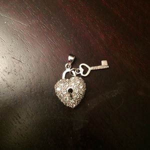 Heart pendant with hanging key