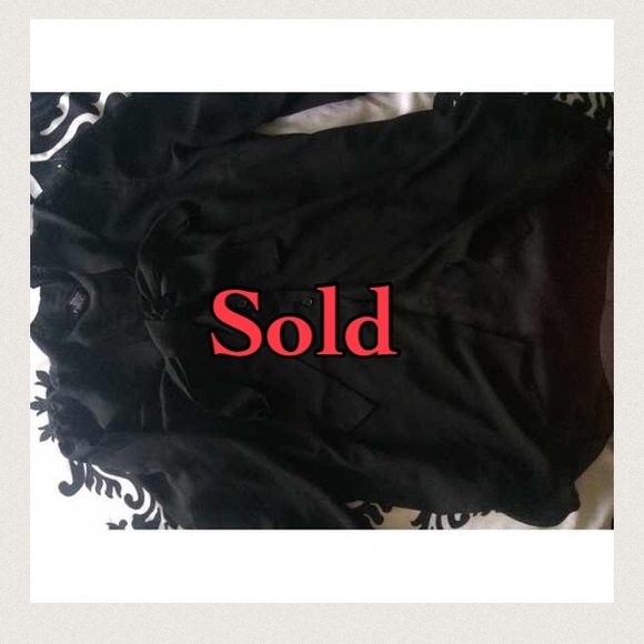 Black blouse.