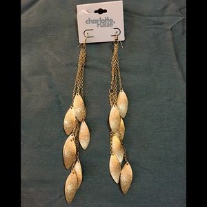 Eye catching gold drape earrings