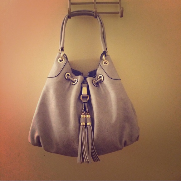 Hobo handbag with tassel