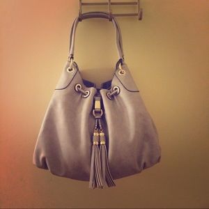 Hobo handbag with tassel