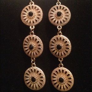 Gold earring with black accents