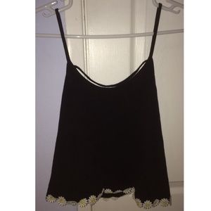 Black camisole with daisy lining.