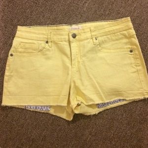 Yellow denim shorts