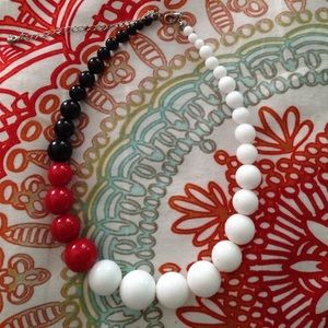 Red, black and white beaded necklace