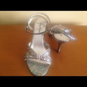 Silver multi color faux snakeskin sandals.