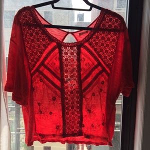 Red top with crochet and open back detail!