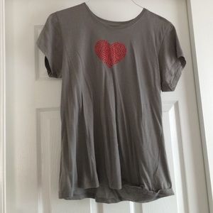 a gray, short sleeved top