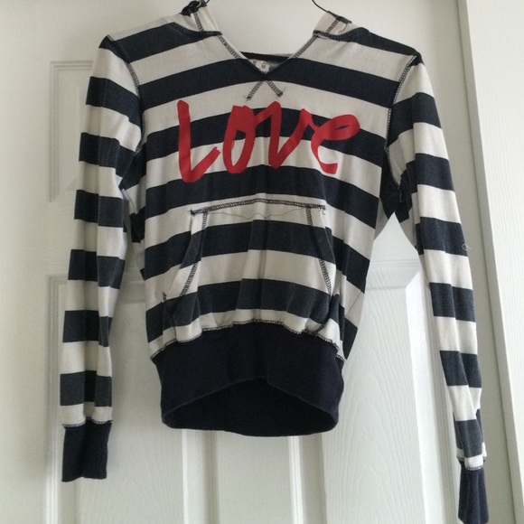 A cream white and navy blue sweatshirt.