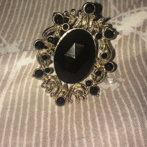 Black and gold ring