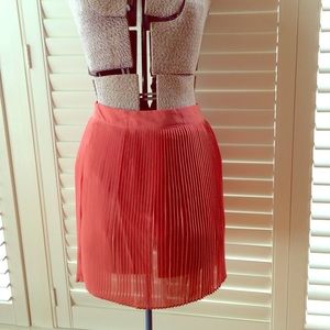 Beautiful autumn colors! Coral pleated skirt