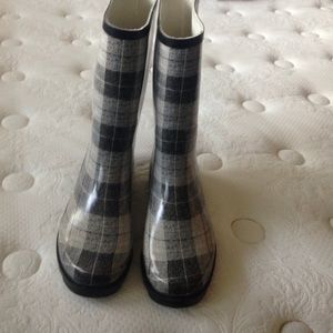 Black and white rain boots