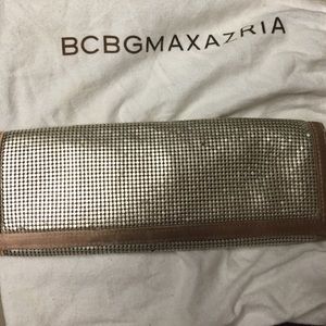 Beautiful peach sequence clutch by BCBG