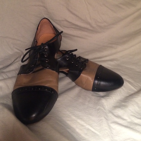 Black and brown Oxford type shoes