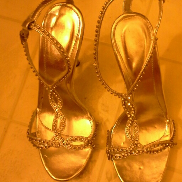 Pair of siler and sequence high heel shoes.