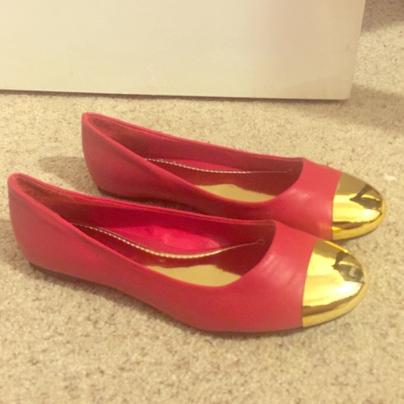 Red flats with gold cap toe