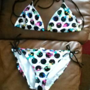 Black white polka dot bikini with paint splatter