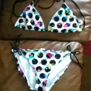 Black white polka dot bikini with paint splatter