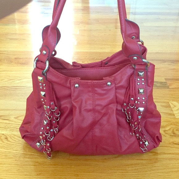 Red Kathy bag with fringes.