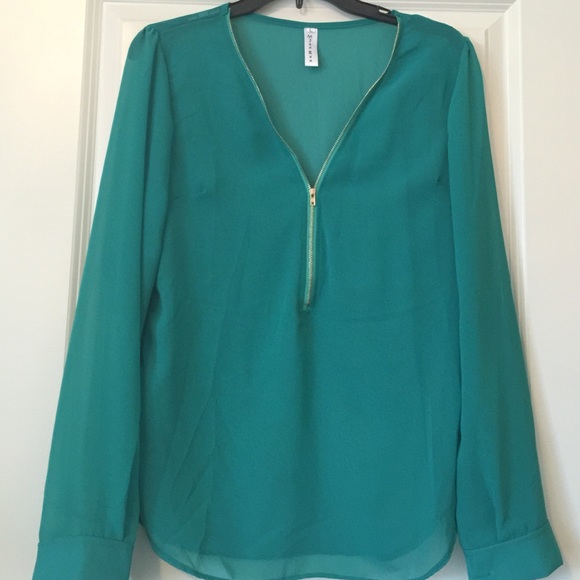 Beautiful sea green top with gold zip BRAND NEW