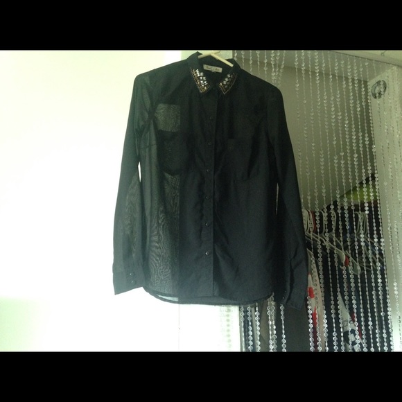 Black shirt .