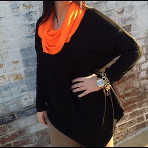 Black asymmetrical tunic with piko sleeve