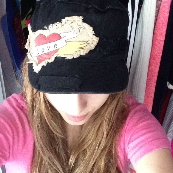 Black hat with Ed Hardy design on the front
