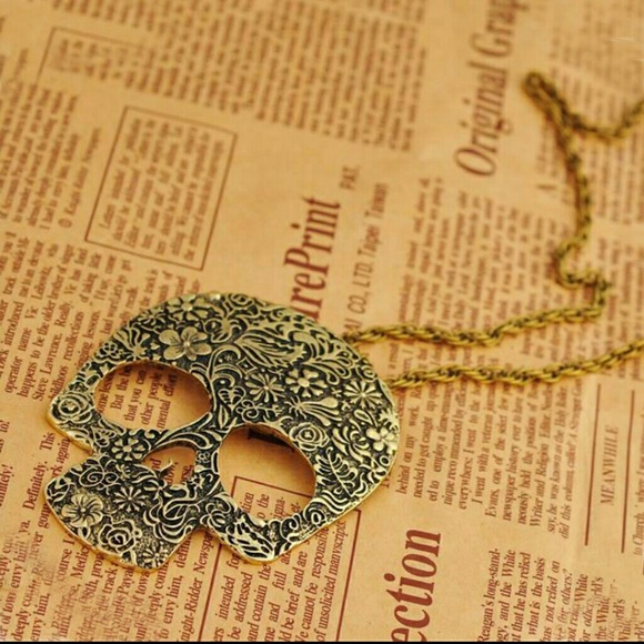 Engraved Bronze Skull necklace