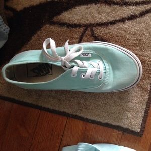 Pair of mint green vans