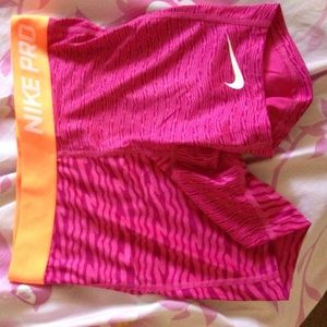 Orange and pink nike pros spandex