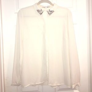 Forever 21 Creme blouse with embellished collar.