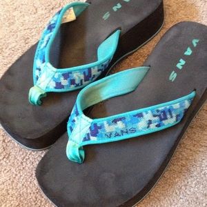 Turquoise and blue flip flops