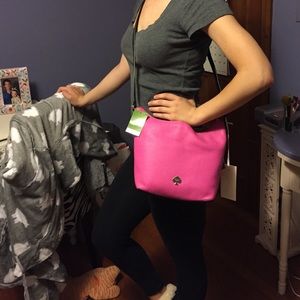 Pink Kate spade cross body never been used