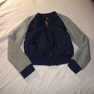 Blue and grey zip up jacket