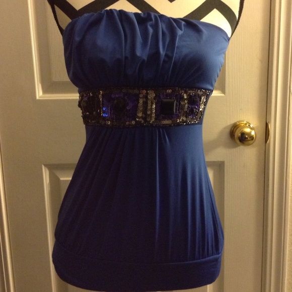 Wet Seal top w/ rhinestone type material.