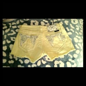 RESERVED! yellow miss me shorts. size 25