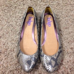 Gold and black animal print clarks